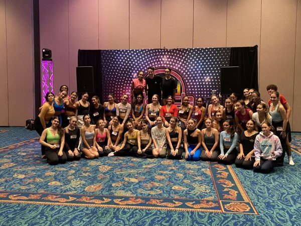 Attendees of the Wild Dance Intensive pose for a picture after a day of classes. I feel like I came back a better dancer and I learned a lot of new skills, Sophomore Sofia Abreu said.
