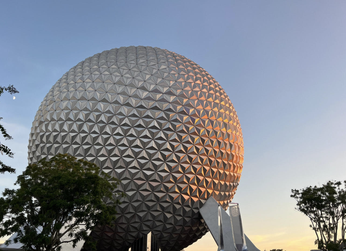 Disneys iconic monument in Epcot housing Spaceship Earth. This sphere showcases spectacular lighting shows, being a symbol for one of four Disney parks.