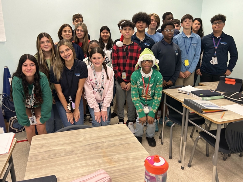 Students of Ms. Palumbos class dressed up for Ugly Sweater Day on December 19. Everyone celebrates the holidays so it shouldnt just be for half of the school, said freshman Sydney Leath.