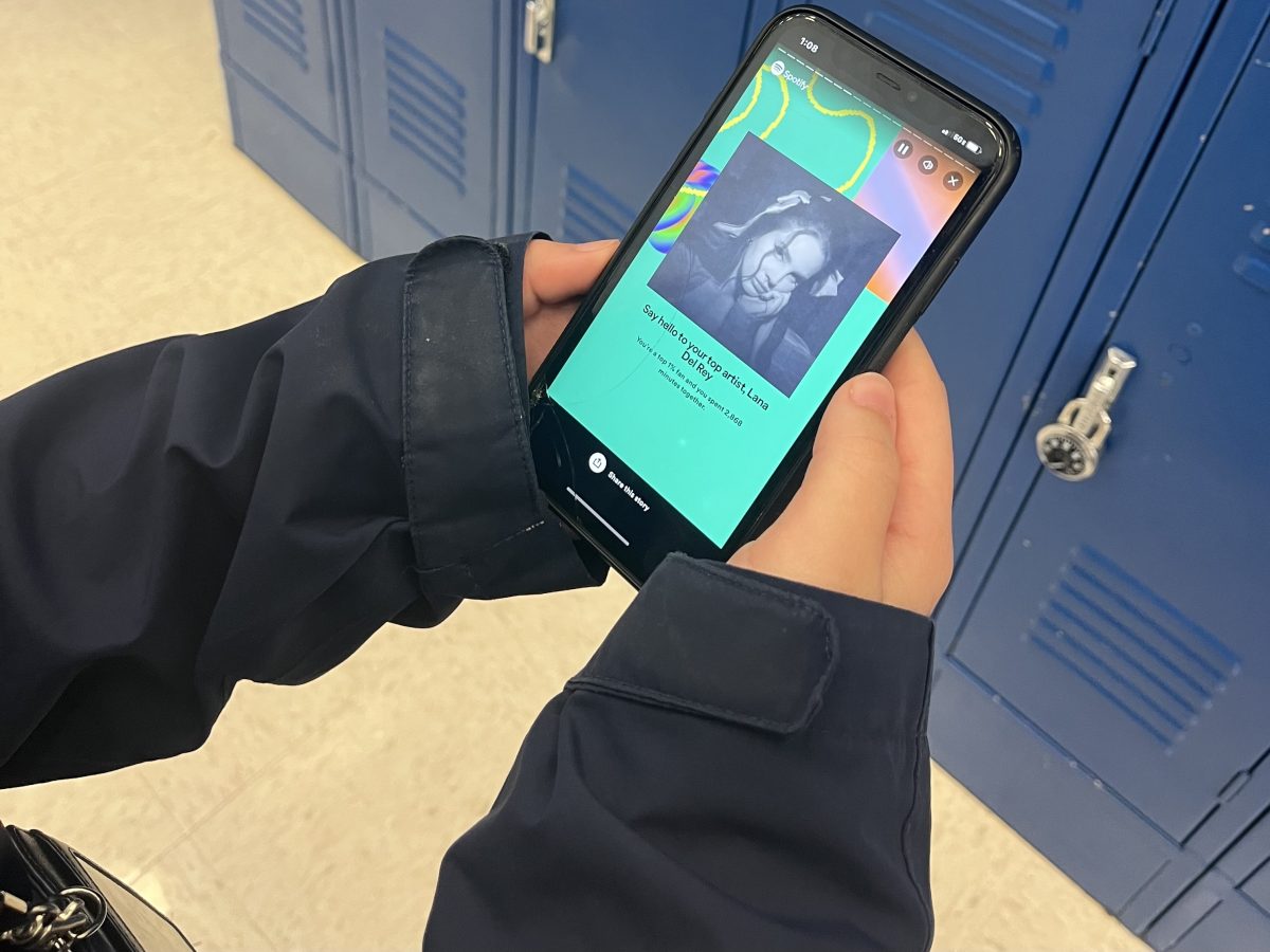 Student Sam Springer, looking at her top artist of the year on Spotify Wrapped. She got insights on being her top 1% artist and found that she listened to her music for 2,868 minutes.