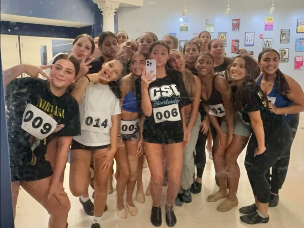 All the contestants at the Momentum Dance tryouts posing together for a picture.
