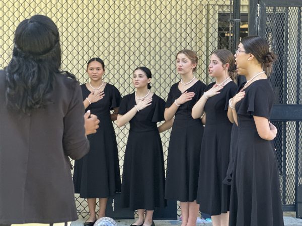 This is the girls' chorus performing at the Peace Day conference on September 20th in front of the school's entrance.