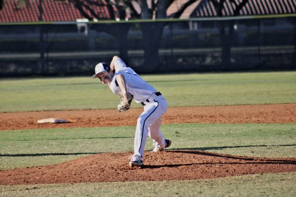 Jack Foti pitching in a preseason game at Arch Bishop