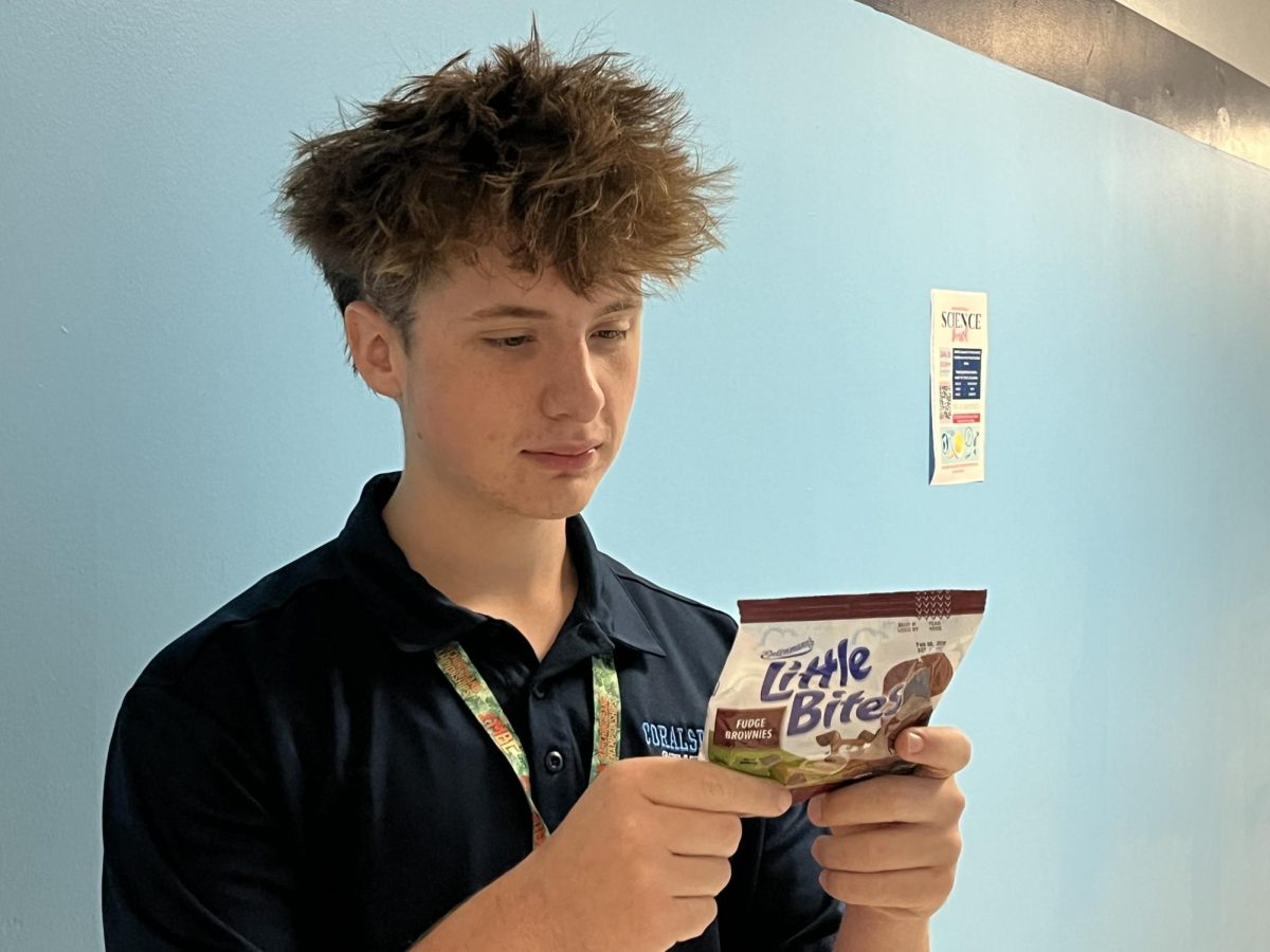 Student examining added sugar content on a popular snack.