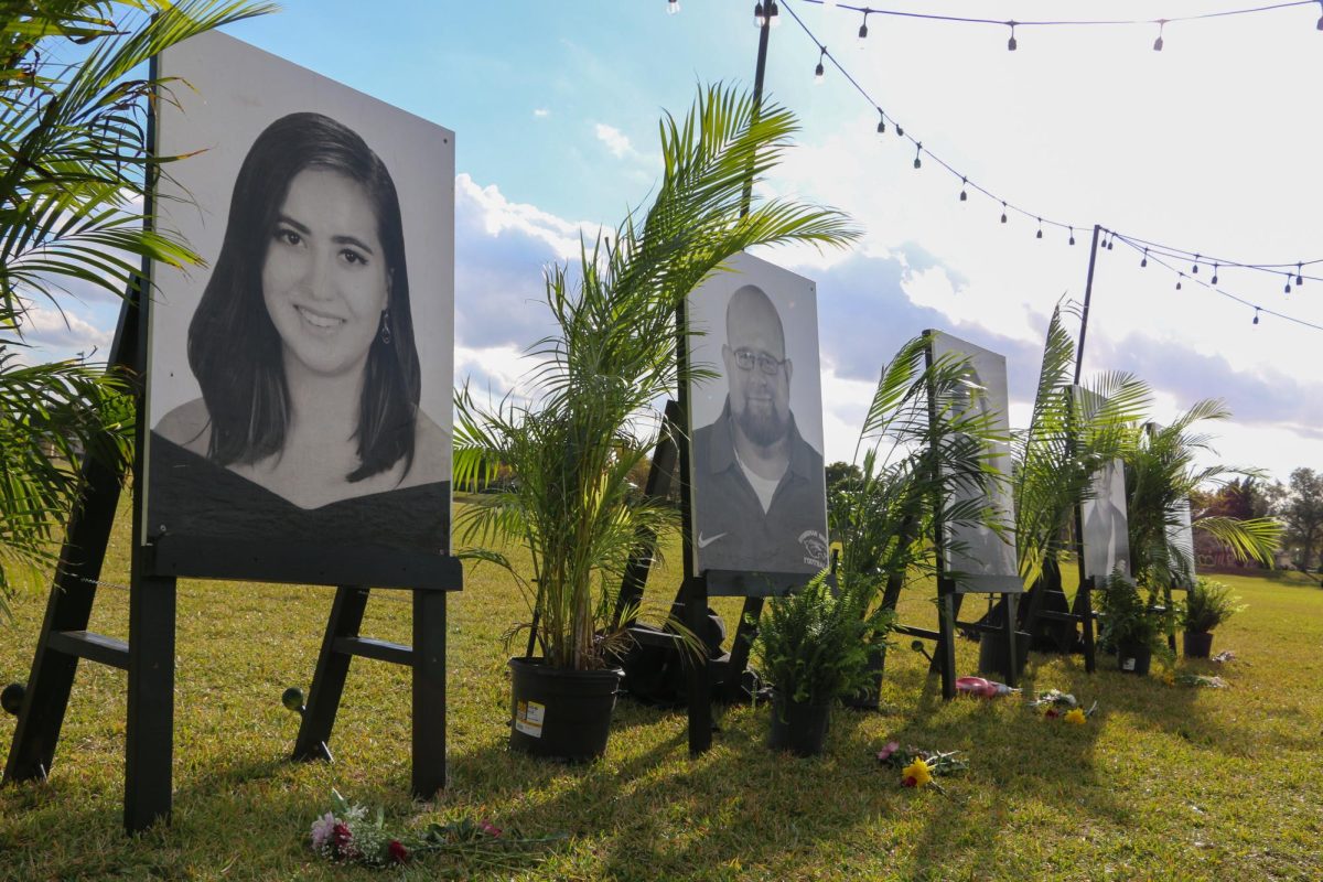 Portraits of the victims displayed at the Parkland Amphitheater during a memorial event to honor the lives lost in the Marjory Stoneman Douglas tragedy.